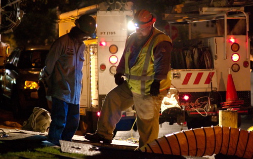 LADWP Employees repair a fire damaged underground power line.